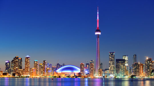 Toronto,Sunset,Over,Lake,Panorama,With,Urban,Skyline.